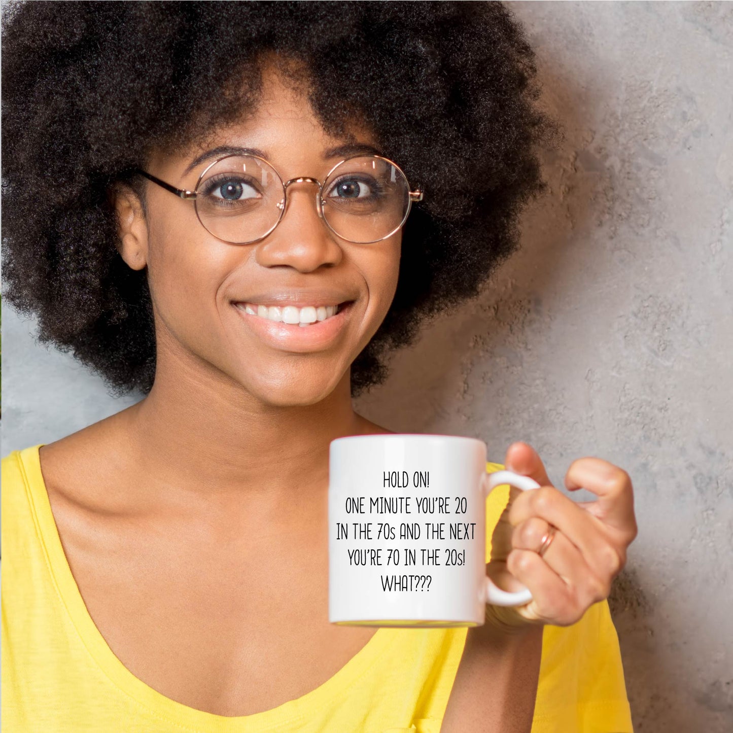 Funny 70th birthday Coffee Mug. it says "Hold on! one minute you’re 20 in the 70s and the next you’re 70 in the 20s! What??? ". 11 oz all white tea cup.