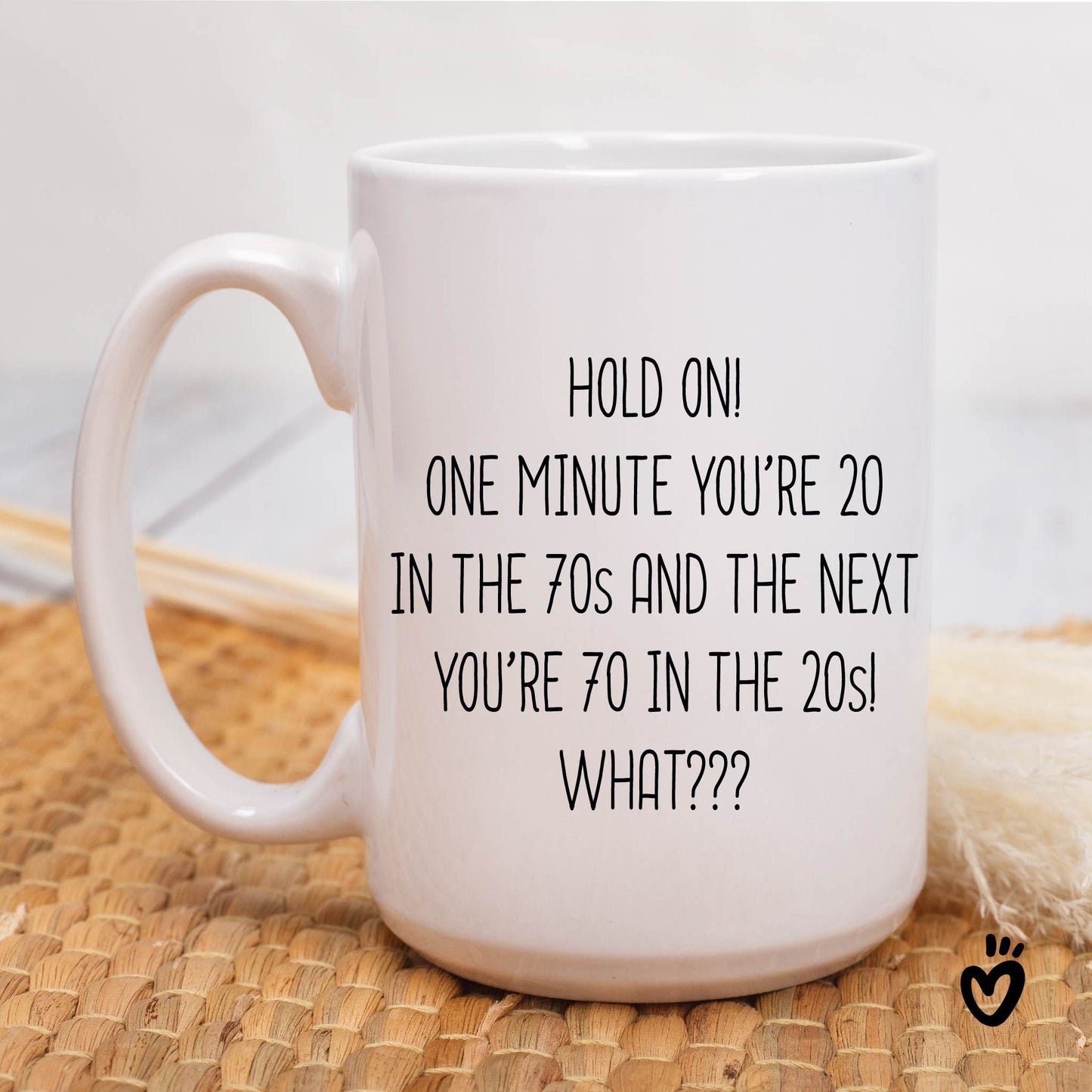 Funny 70th birthday Coffee Mug. it says "Hold on! one minute you’re 20 in the 70s and the next you’re 70 in the 20s! What??? ". 15 oz all white  tea cup.